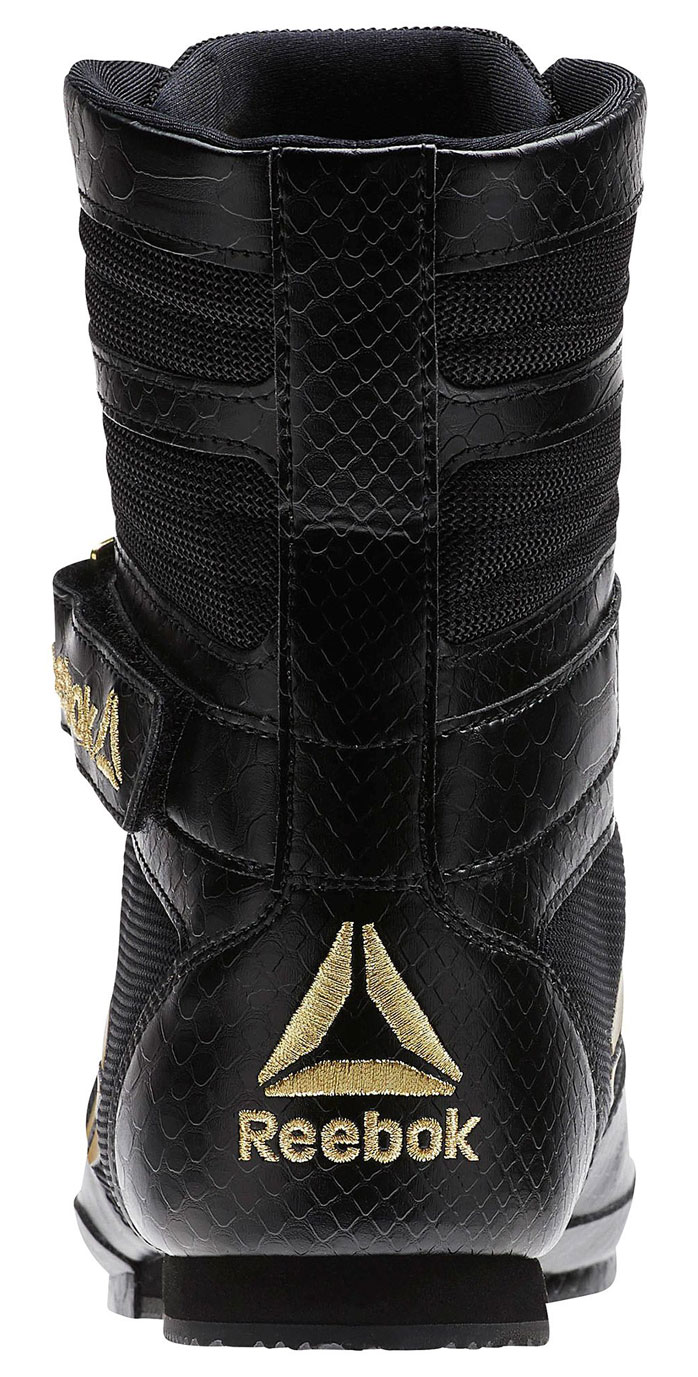 gold and black boxing boots
