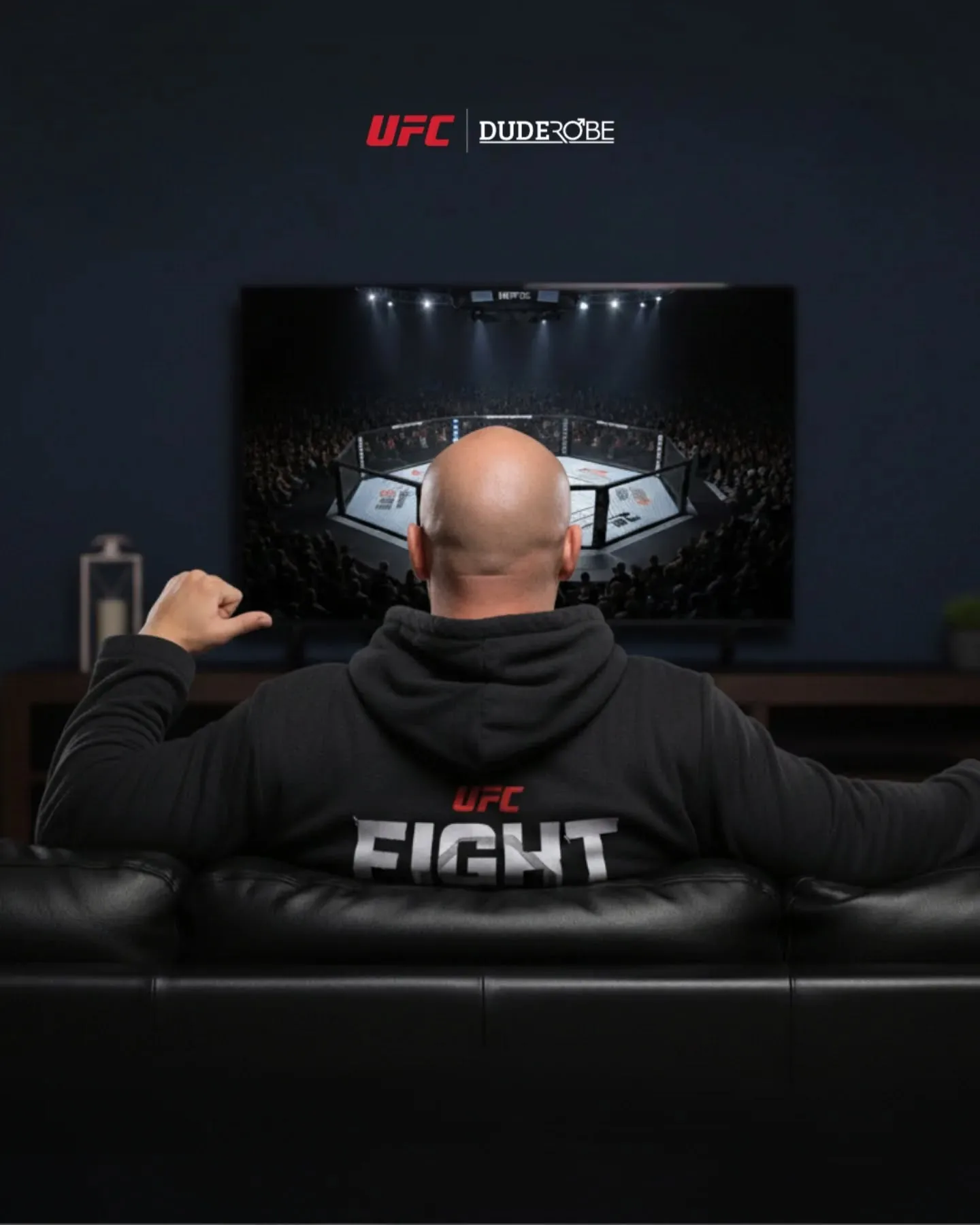 UFC fan wearing DudeRobe while watching UFC fight night at home