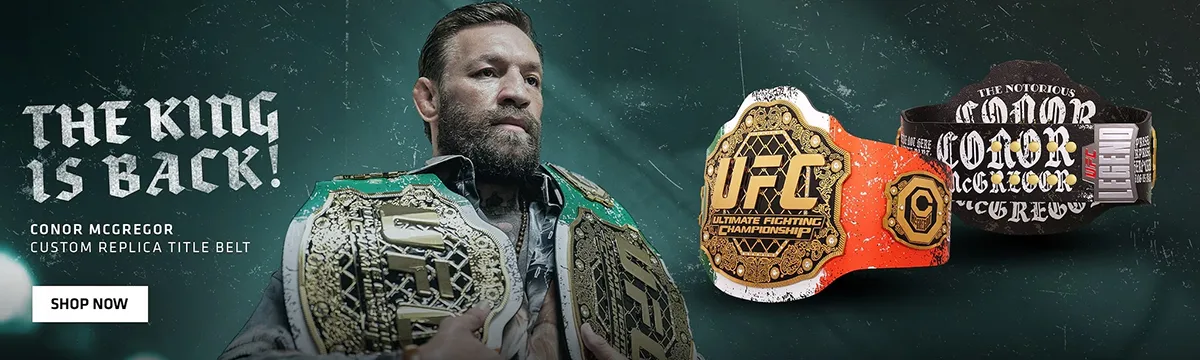 Promotional banner featuring Conor McGregor with the UFC 329 Classic Signature Replica Belt.