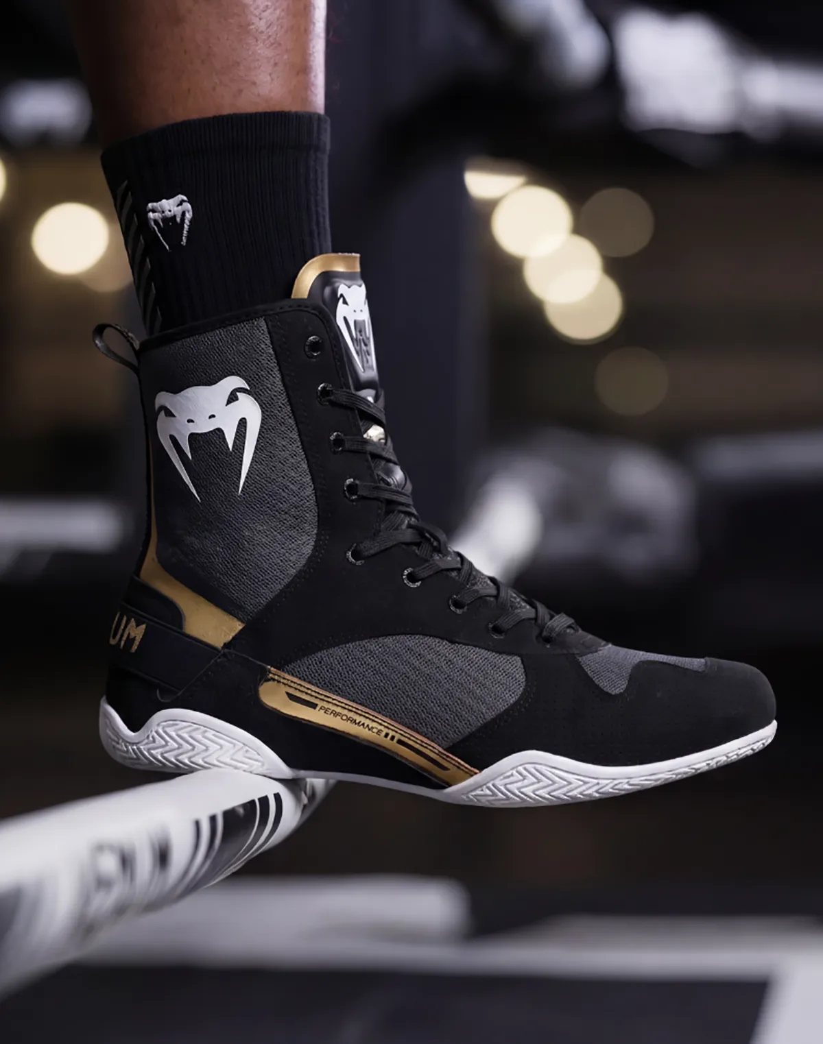 Black, white and gold Venum Elite boxing shoes